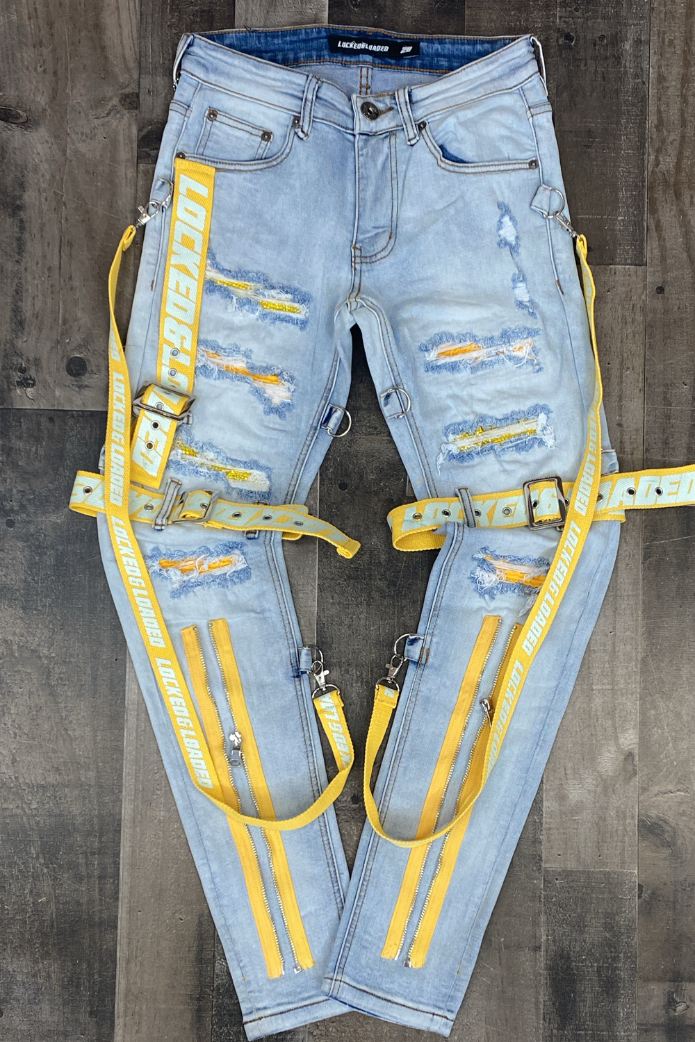 Locked Loaded- locked & loaded strapped studded jeans (light blue/yellow)