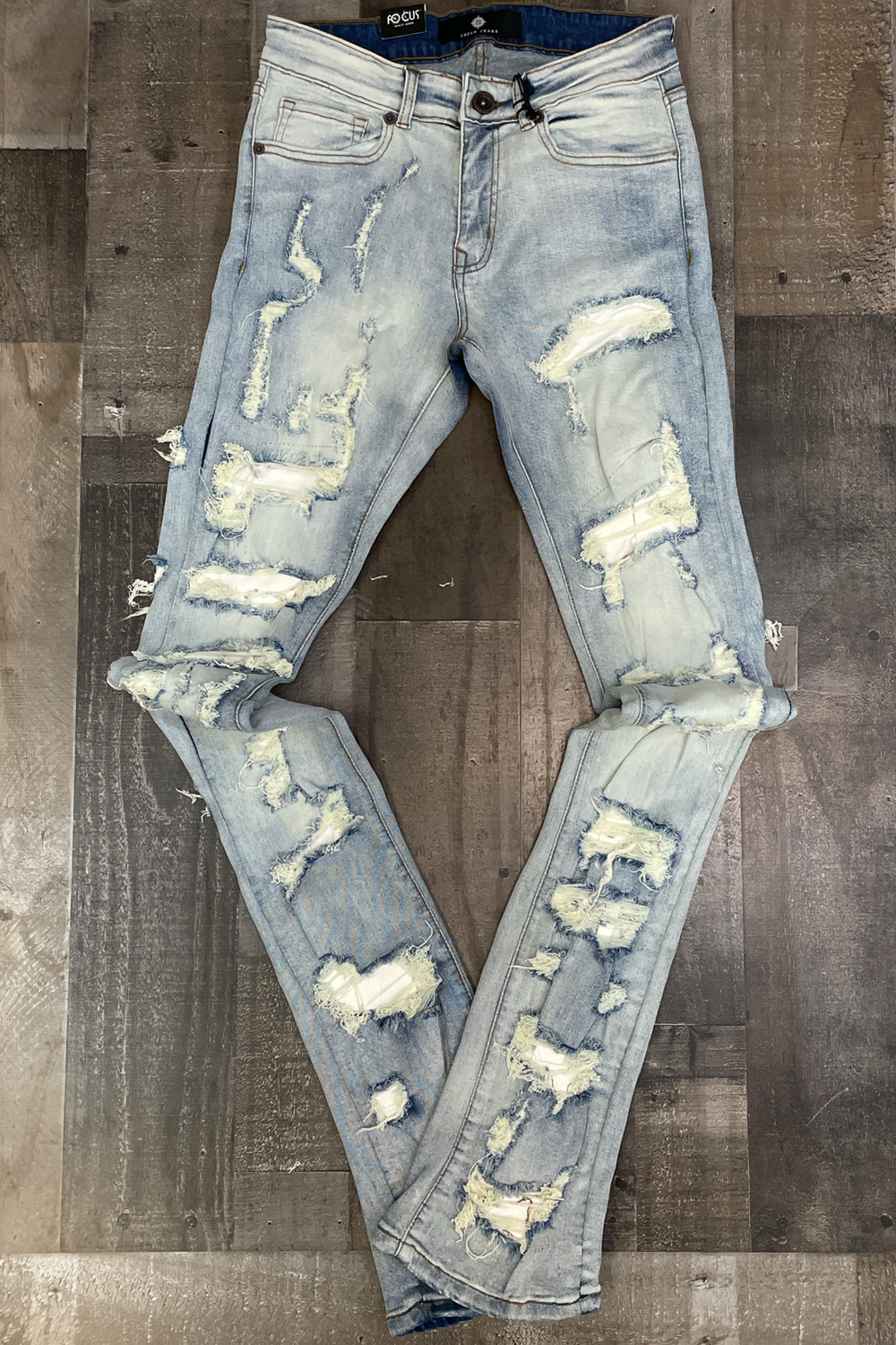 Focus- heavy distressed stacked denim jeans (Vintage)